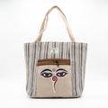The Himal Buddha Eyes Stripe Tote, front